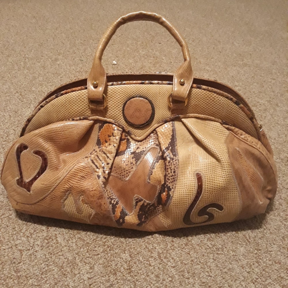 Vintage Leather Sharif Satchel in shades of Tans and Browns.  17"